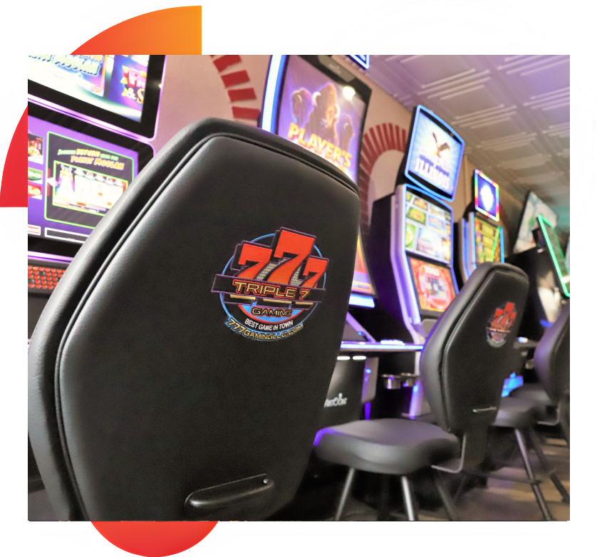 A row of chairs in front of a wall with many different types of screens.