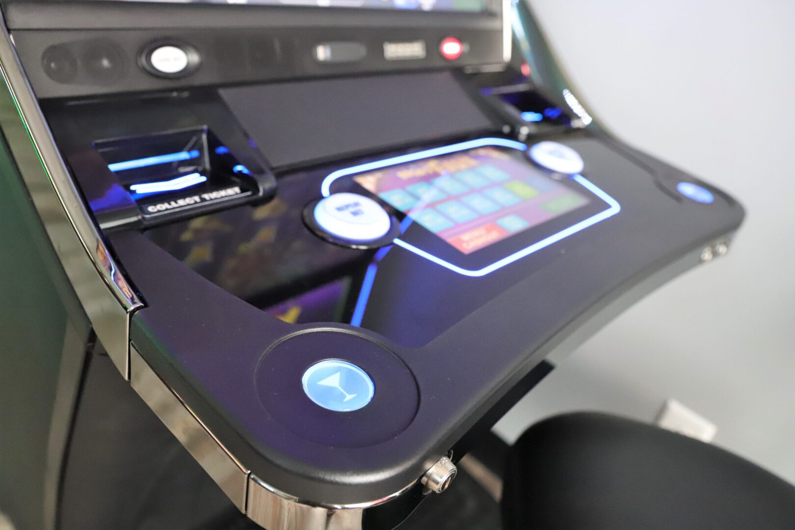 A table with a tablet and buttons on it
